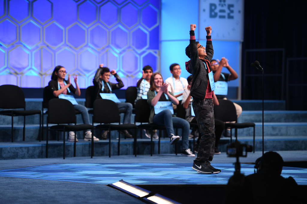 Rishik Gandhasri celebrates his win at the 2019 Scripps National Spelling Bee.