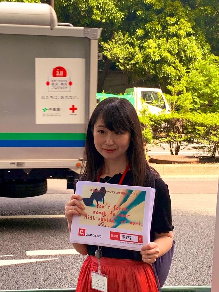 Yumi Ishakawa with her petition.
