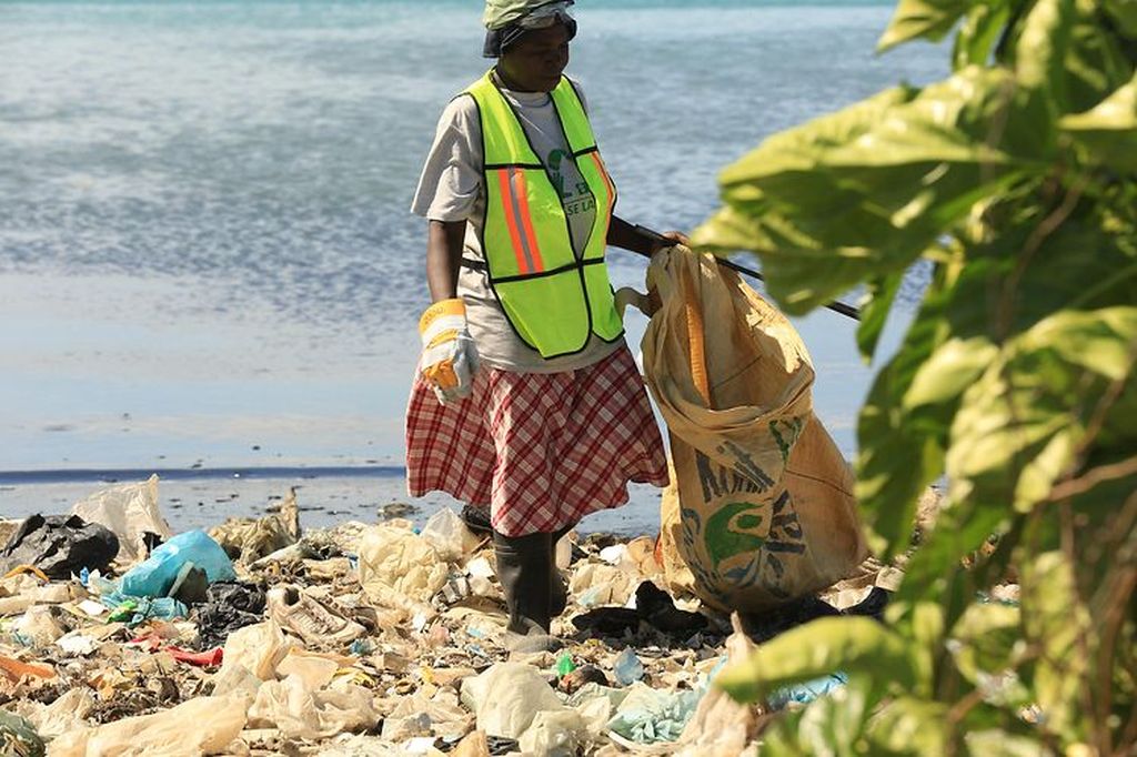 Collecting recycling in Haiti.