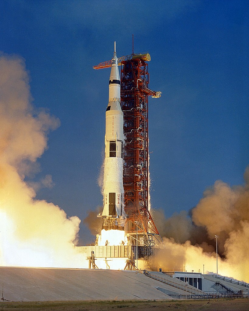 The Apollo 11 Saturn V space vehicle lifts off with astronauts Neil A. Armstrong, Michael Collins and Edwin E. Aldrin, Jr., at 9:32 a.m. EDT July 16, 1969, from Kennedy Space Center's Launch Complex 39A.
