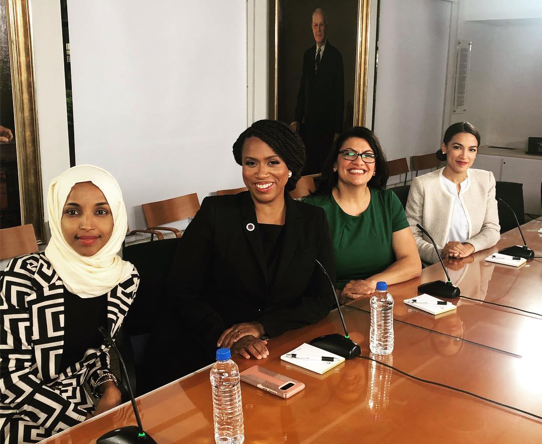 Ilhan Omar of Minnesota, Ayanna Pressley of Massachusetts, Rashida Tlaib of Michigan, and Alexandria Ocasio-Cortez of New York