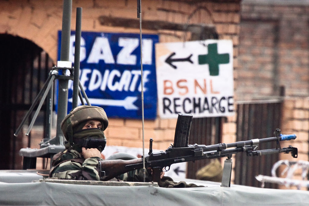 A soldier guards the roadside checkpoint outside Srinagar International Airport (SXR) in Jammu and Kashmir, India. (January 2009)