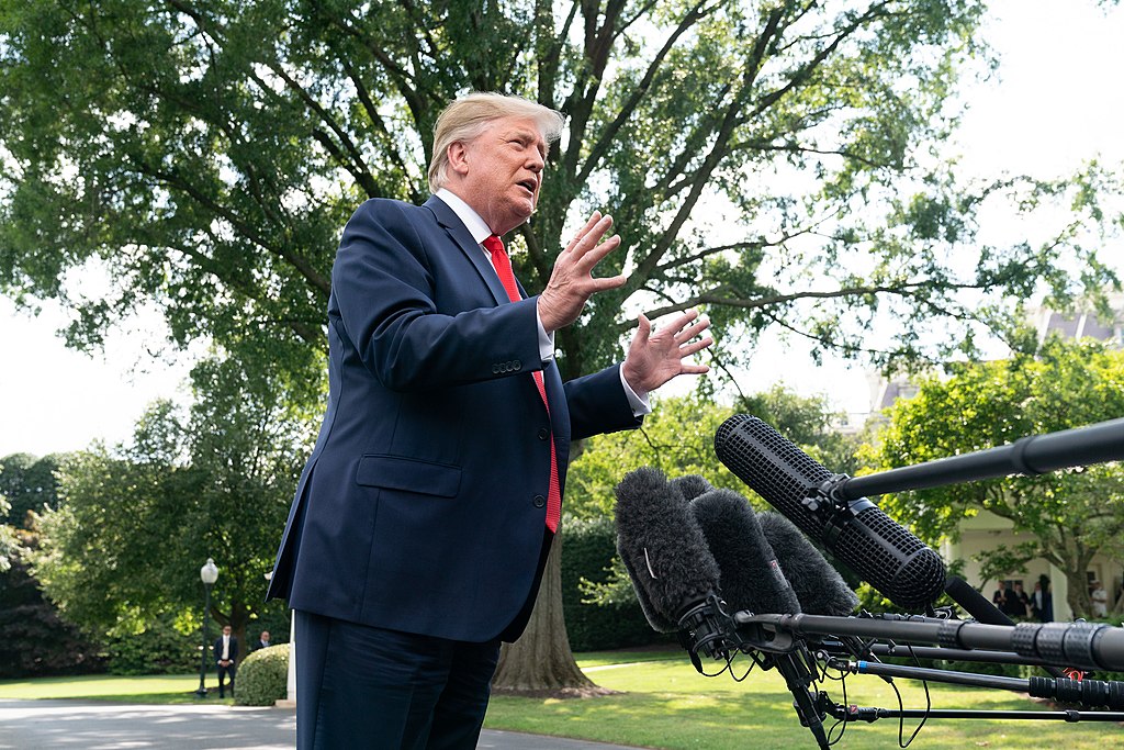 President Donald J. Trump talks to members of the press on the South Lawn of the White House Wednesday, July 24, 2019