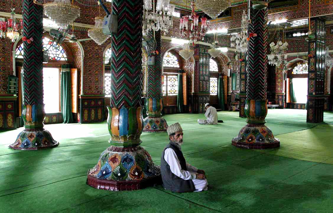 Men in a mosque in Srinagar, Kashmir in India.