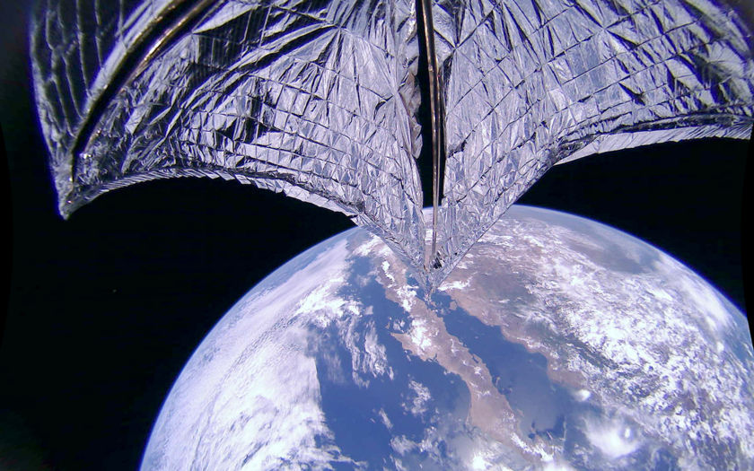 This image was taken during the LightSail 2 sail deployment sequence on 23 July 2019 at 11:48 PDT (18:48 UTC). Baja California and Mexico are visible in the background. LightSail 2's dual 185-degree fisheye camera lenses can each capture more than half of the sail. This image has been de-distorted and color corrected.