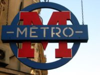 Sign of Paris' metro. Style first used in 1937 and first use of single M-in-a-circle.