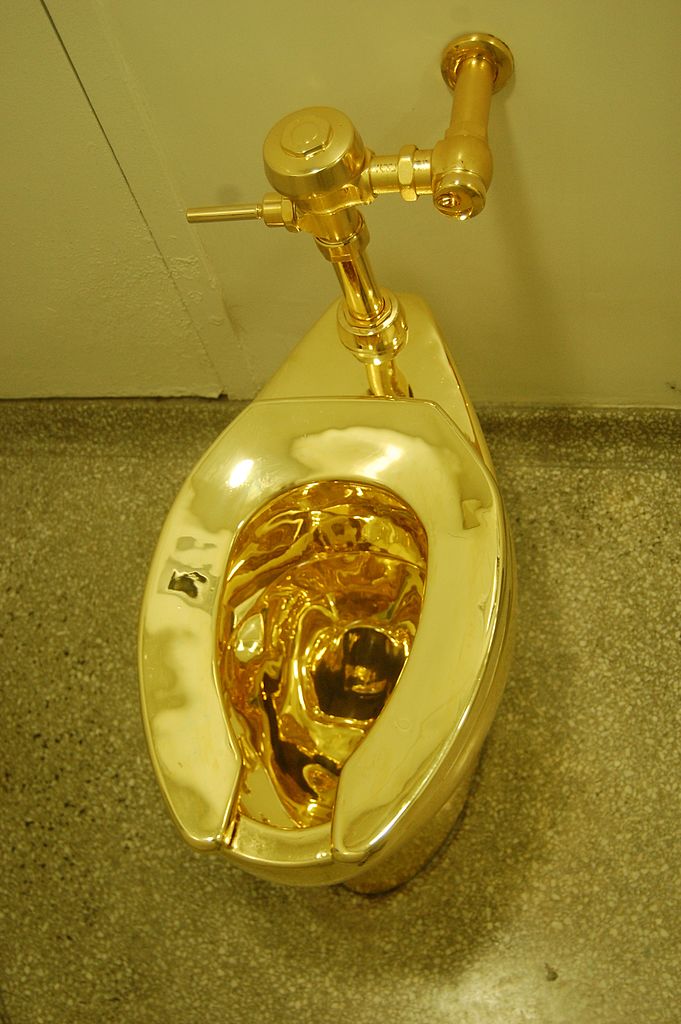 America is a satirical sculpture by the Italian artist Maurizio Cattelan. It is a fully functioning toilet made of solid gold.