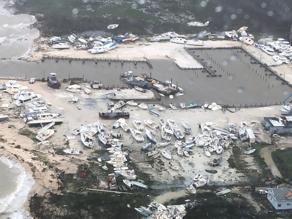 Coast Guard Air Station Clearwater MH-60 Jayhawk helicopter crews, forward deployed to Andros Island, conduct medical evacuations in support of search and rescue and humanitarian aid in the Bahamas, Sept. 2, 2019.