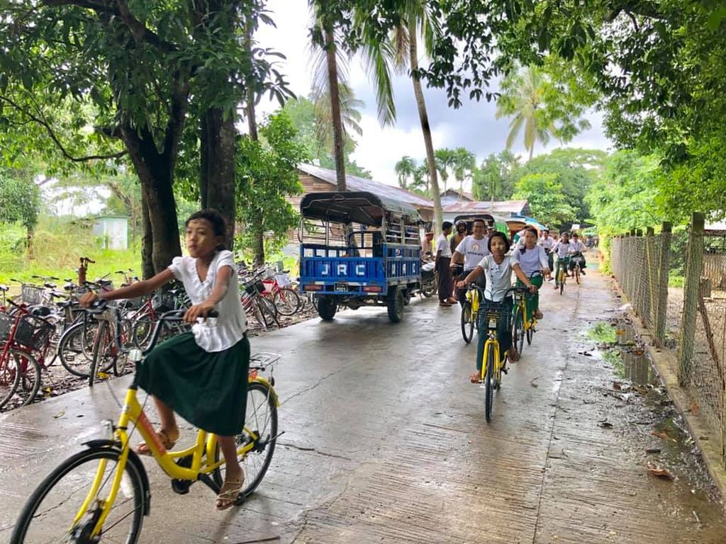 Biking to school in Myanmar.