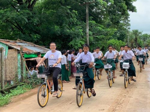 Biking to school in Myanmar.