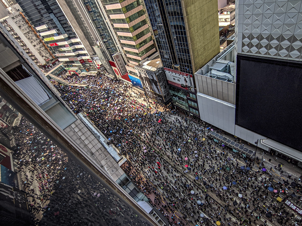 Tens of thousands of protesters took to the streets in Hong Kong on Tuesday, even though protests weren't allowed.