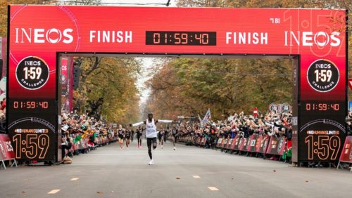 Eliud Kipchoge celebrates as he crosses finish line and makes history to become the first human being to run a marathon in under 2 hours. The INEOS 1:59 Challenge, Vienna, Austria. 12 October 2019.