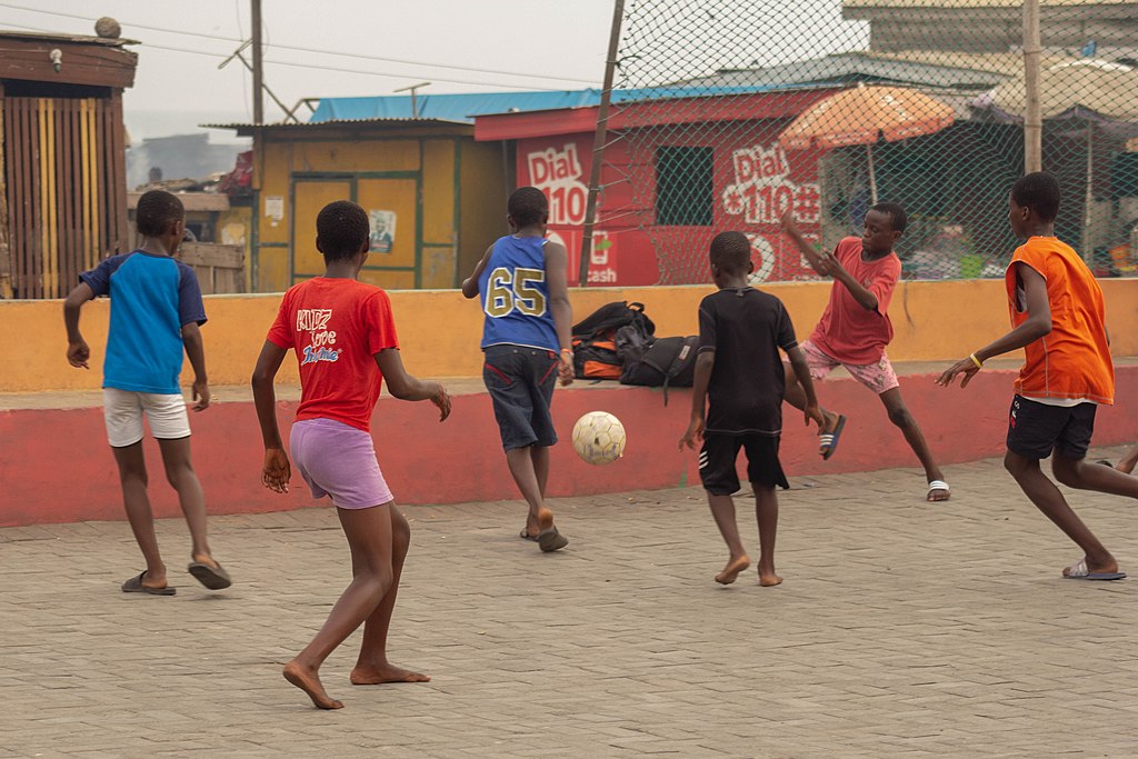 playing soccer in the neighbourhood