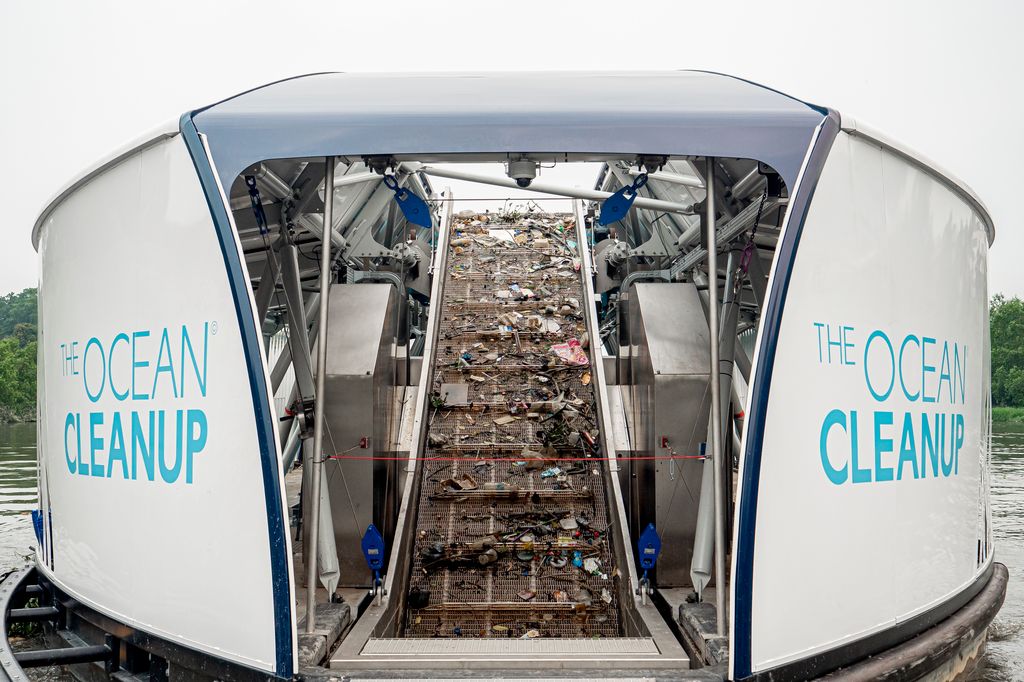 View of the Ocean Cleanup's Interceptor's conveyor belt removing trash from the river.