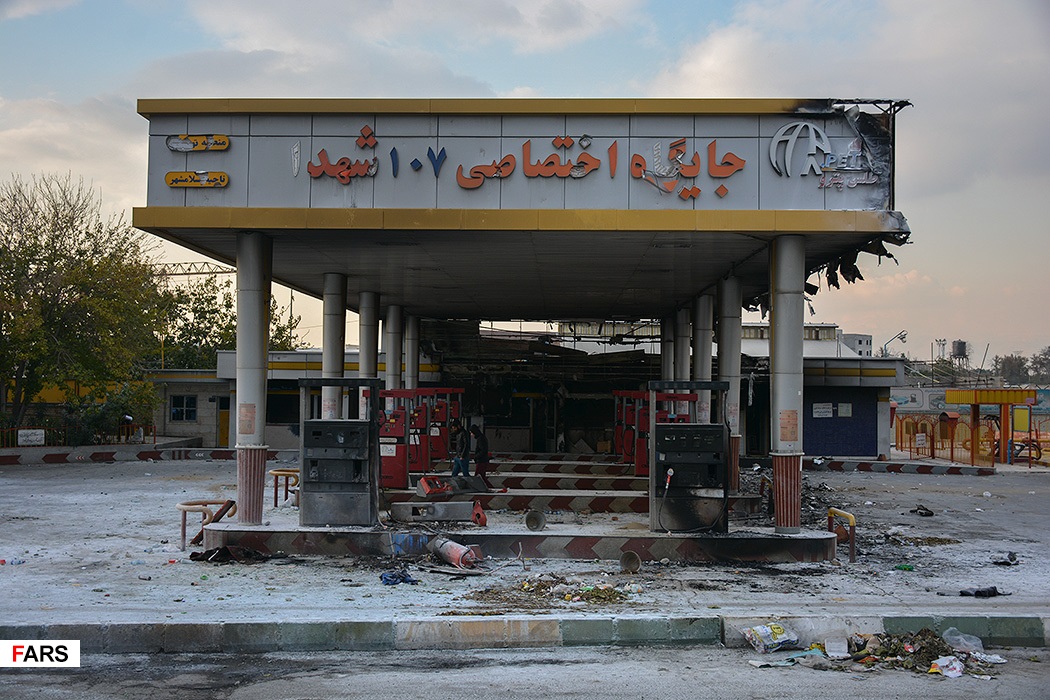 Protesters in Iran set fire to a gas station.