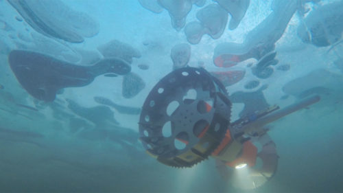 NASA's BRUIE, or the Buoyant Rover for Under-Ice Exploration, a two-wheeled underwater rover, is being tested under an Arctic lake.