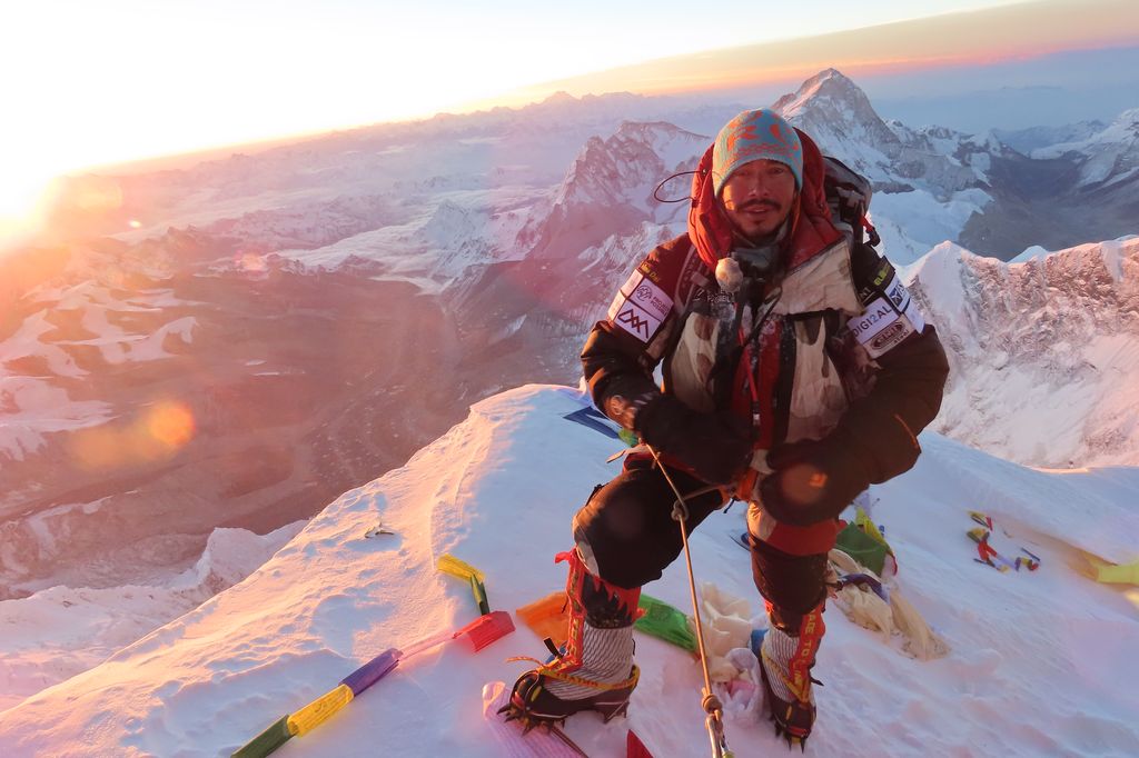 Nims Purja at the top of Everest.