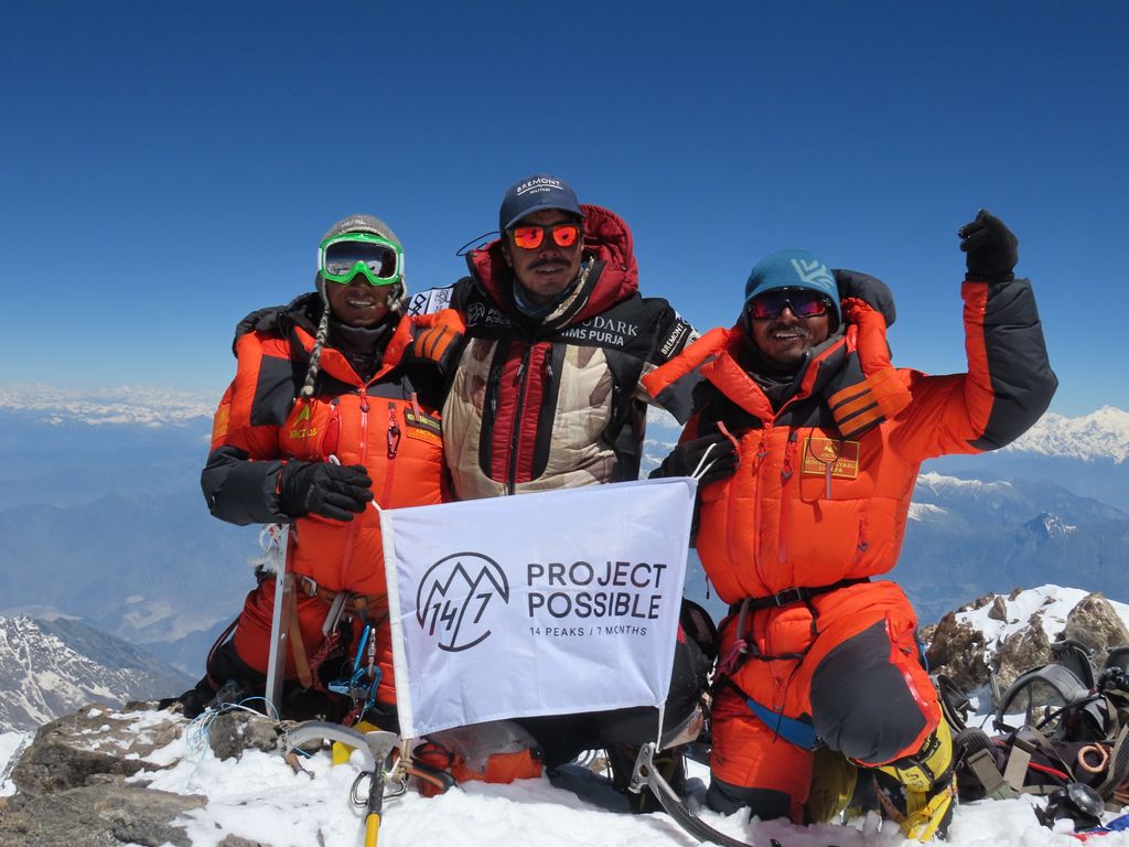 Nims Purja and some of his team members at the top of Nanga Parbat in Pakistan.