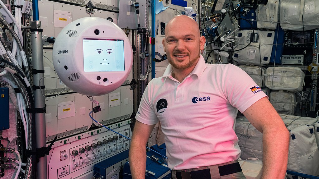 ESA astronaut Alexander Gerst with CIMON, an artificial intelligence helper aboard the station.