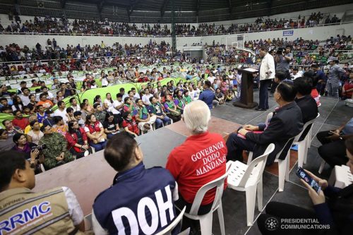 President Rodrigo Roa Duterte delivers a speech during his visit to the families affected by the Taal Volcano eruption at the Batangas City Sports Coliseum on January 14, 2020.