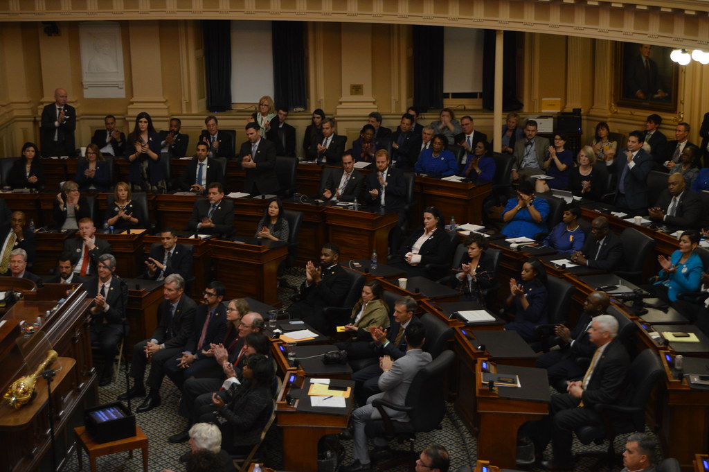 Members of the General Assembly listen on as Gov. Ralph Northam delivers his State of the Commonwealth address. By Jimmy O'Keefe