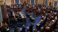 US Chief Justice John Roberts swears in Senators as the impeachment trial of Donald Trump begins in the US Senate.