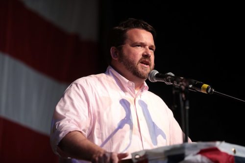 Troy Price speaking with attendees at the 2019 Iowa Democratic Wing Ding at Surf Ballroom in Clear Lake, Iowa.