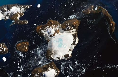 Image showing the rapid melting of the snowpack on Eagle Island at the tip of the Antarctic Peninsula after a 9-day warm period.