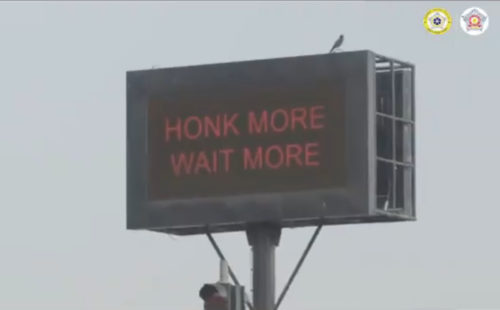 'Honk More, Wait More' sign used in connection with the 'Punishing Signal' by Mumbai Police.