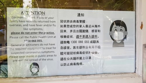Warning outside medical centre in Sydney due to outbreak of coronavirus