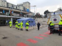 Civil Protection volunteers set up a tent at the emergency room of the Padua Hospital Company to deal with the SARS-CoV-2 epidemic.
