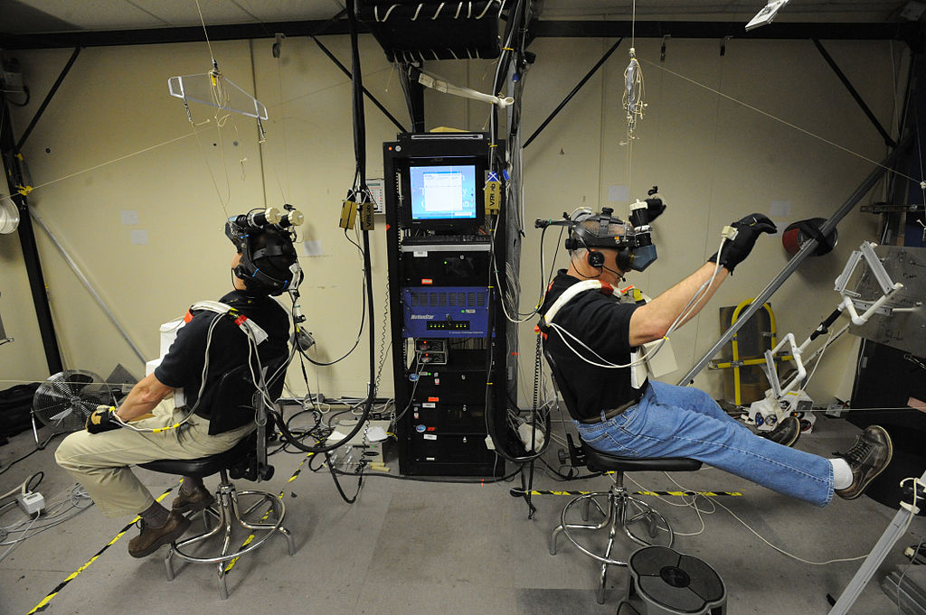 HOUSTON (March 24, 2009) Astronauts Tom Marshburn, left, and Dave Wolf train for a spacewalk in the Integrated EVA/RMS Virtual Reality Simulator Facility at Johnson Space Center. Marshburn and Wolf are members of STS-127 and will take a space flight with Lt. Cmdr. Chris Cassidy in an upcoming mission to the International Space Station in June. (U.S. Navy photo by Mass Communication Specialist 2nd Class Dominique M. Lasco/Released)