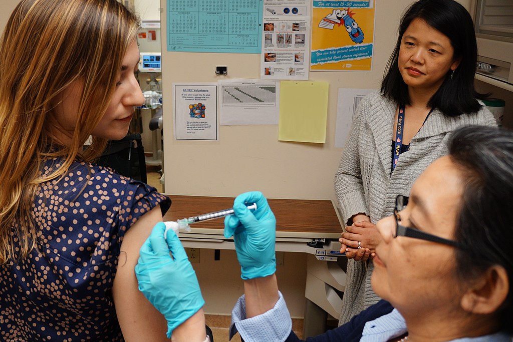 A healthy volunteer receives an experimental universal influenza vaccine known as H1ssF_3928 as part of a Phase 1 clinical trial at the NIH Clinical Center in Bethesda, Maryland. Scientists at NIAID’s Vaccine Research Center (VRC) developed the vaccine.