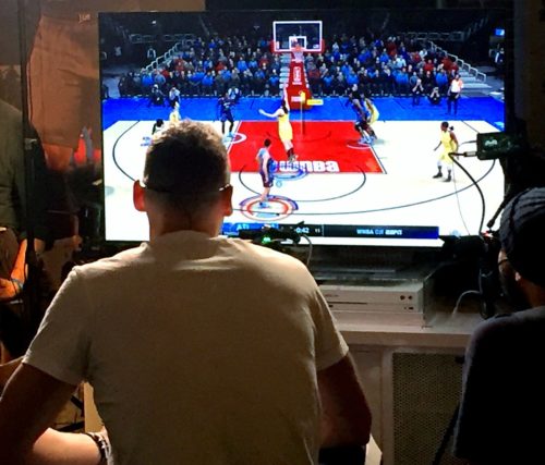 Los Angeles Clippers forward Sam Dekker pictured playing NBA LIVE 18 video game at the 2018 NBA All-Star Weekend in Los Angeles, California.