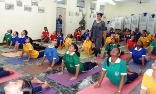 Children perform yoga at the Naval Children School, Mumbai in 2015