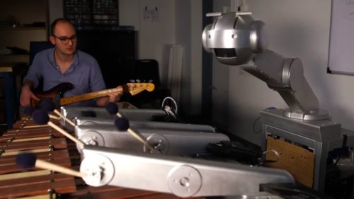 Richard Savery playing with Shimon, the musical robot.