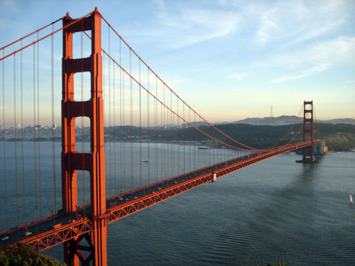 The Golden Gate Bridge and San Francisco, CA at sunset. This photo was taken from the Marin Headlands