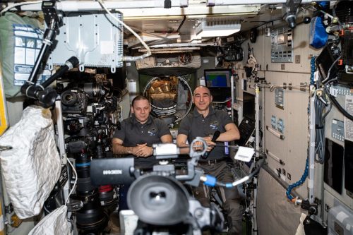 Roscosmos cosmonauts and Expedition 63 Flight Engineers (from left) Ivan Vagner and Anatoly Ivanishin record a public affairs event for Russian media from the International Space Station's Zvezda service module.