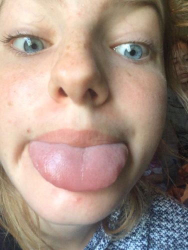 Girl sticking tongue out