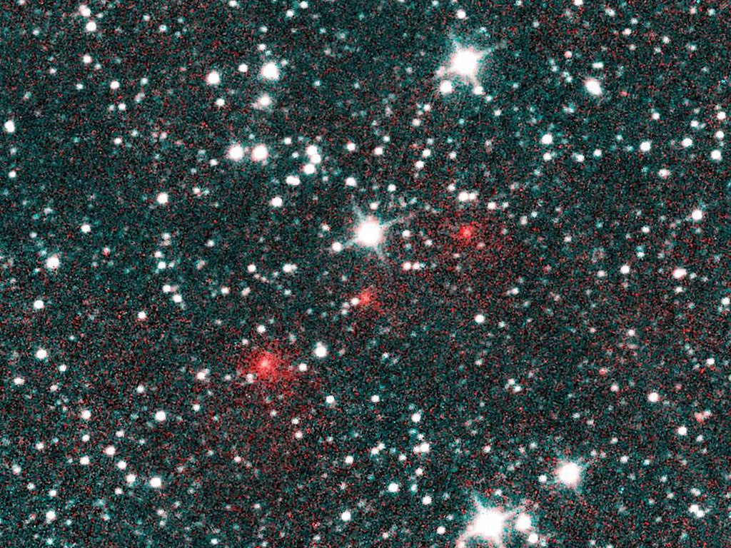 Comet C/2020 F3 NEOWISE appears as a string of fuzzy red dots in this composite of several heat-sensitive infrared images taken by NASA Near-Earth Object Wide-field Infrared Survey Explorer (NEOWISE) mission on March 27, 2020.
