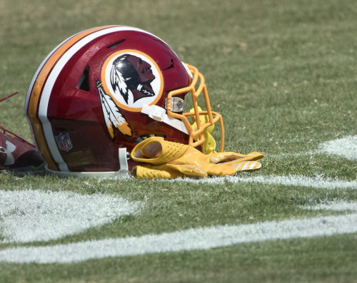 Washington Redskins helmet on field.