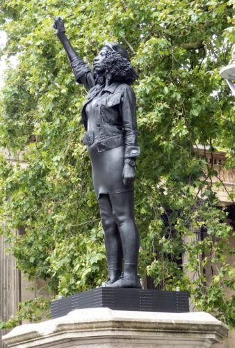 Statue of activist Jen Reid, in place on the plinth that formerly held the statue of Edward Colston.