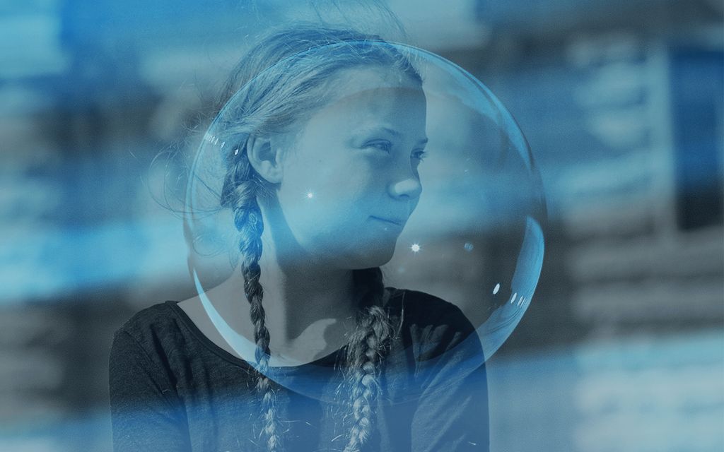 Greta Thunberg seen behind a blue-tinted bubble.