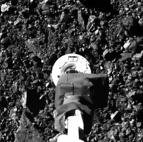 TAGSAM collector touching down on Bennu. This image was taken from the surface of Bennu by the OSIRIS-REx spacecraft just after it landed on the asteroid.