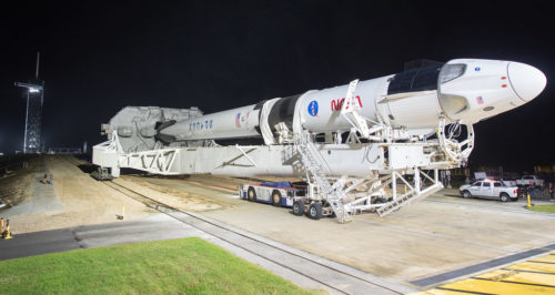 A SpaceX Falcon 9 rocket with the company's Crew Dragon spacecraft onboard is seen as it is rolled out of the horizontal integration facility at Launch Complex 39A as preparations continue for the Crew-1 mission, Monday, Nov. 9, 2020, at NASA’s Kennedy Space Center in Florida.