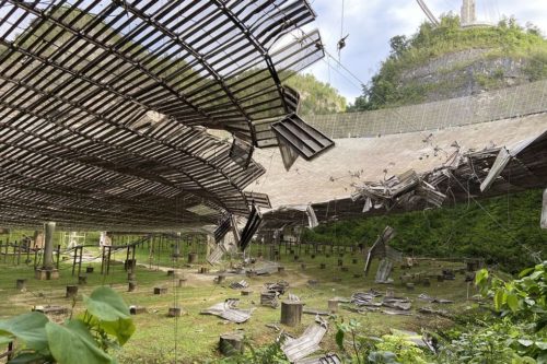 Damage done to the dish at the Arecibo Observatory by a snapped support cable.