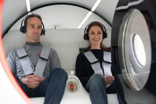 Josh Giegel and Sara Luchian sit inside the XP-2 pod before Virgin Hyperloop's test run.