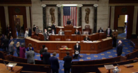 The United States House of Representatives votes to adopt an article of impeachment accusing President Donald Trump of incitement of insurrection, January 13, 2021.