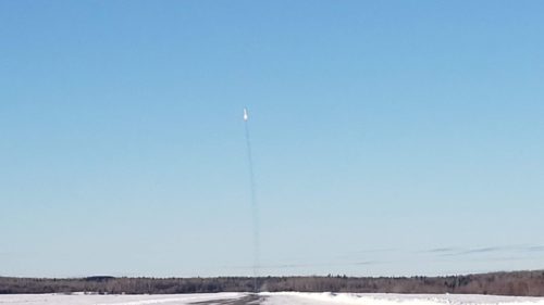 Stardust 1.0, a biofuel-powered rocket developed by bluShift Aerospace, launches high into the sky.