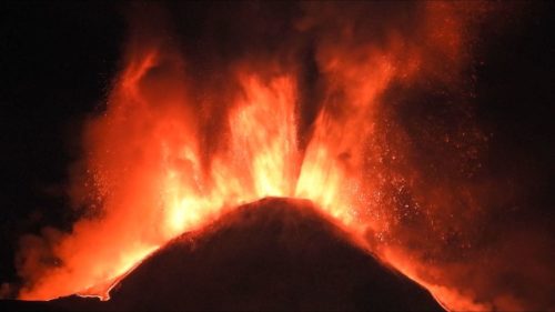 A closeup photo of Mount Etna erupting.